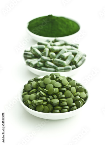 Green chlorella pills or green barley pills and powder.