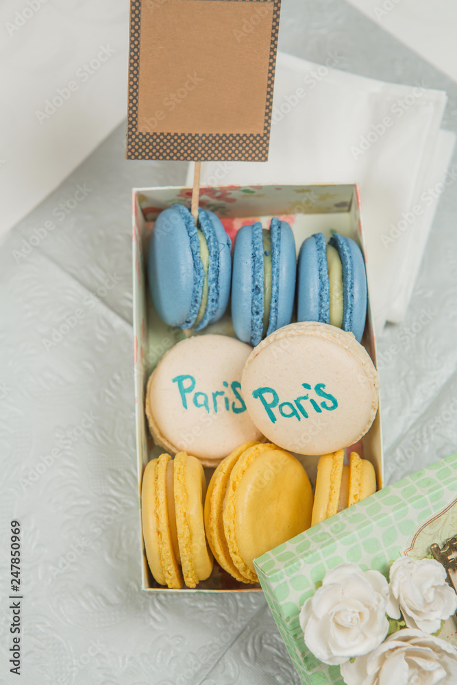 sweet french macaroon on white isolated white background. fly falling sweet macaroni
