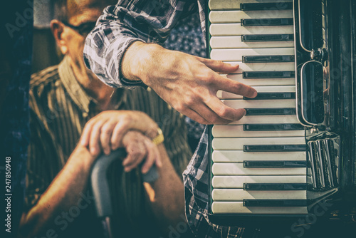 Canvastavla Musician playing his accordian during a street festival