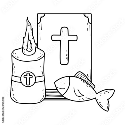 holy bible book with candle