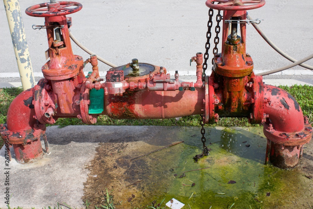 Gate valve leaking water, Red OS&Y valve leaking water from packing