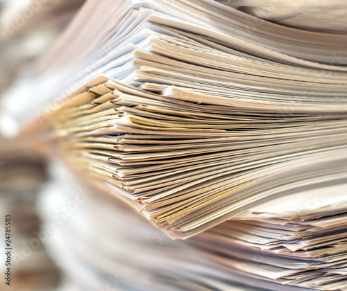 bundles bales of paper documents. stacks packs pile on the desk in the office