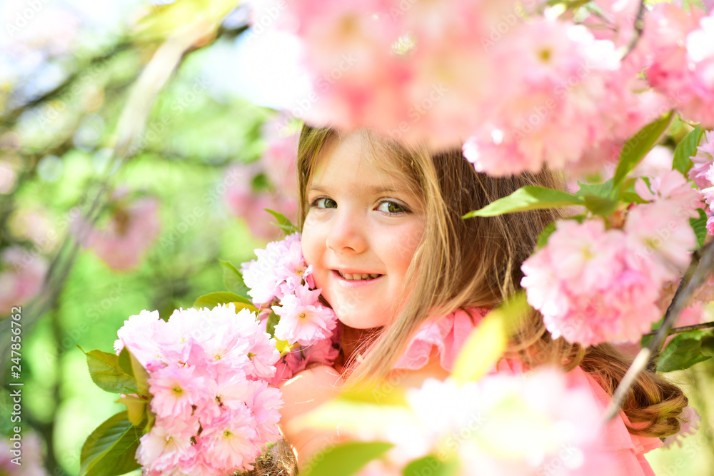 Fototapeta premium Summer girl fashion. Happy childhood. Little girl in sunny spring. Small child. Natural beauty. Childrens day. Springtime. weather forecast. face and skincare. allergy to flowers. I am free