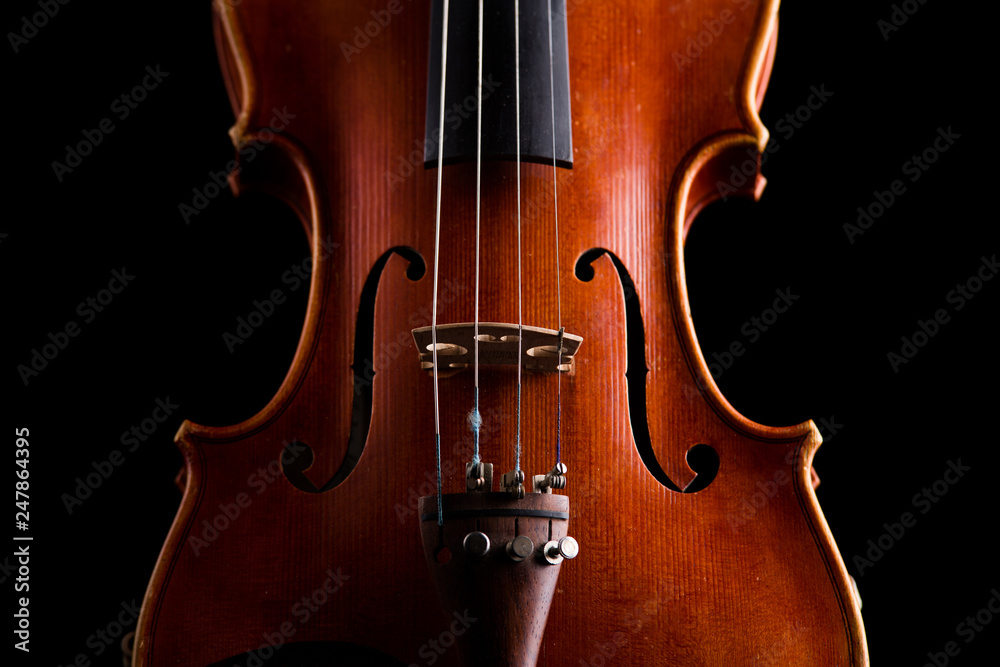 retro violin close-up on a black background retro violin close-up on a black background