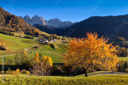 Val di Funes, Santa Maddalena in autunno con le Odle nello sfondo, Trentino Alto Adige photo