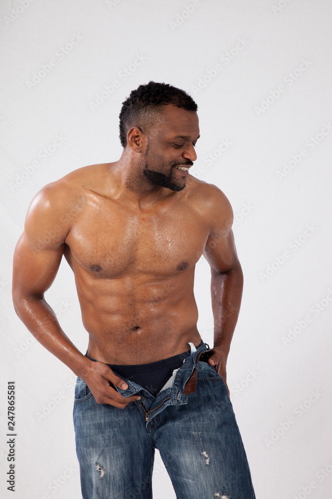 Happy Strong Black man with his shirt off Happy Strong Black man with his shirt off