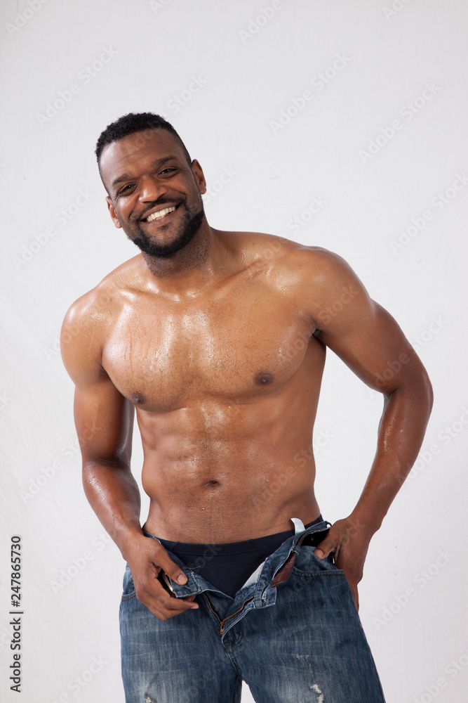 Happy Strong Black man with his shirt off