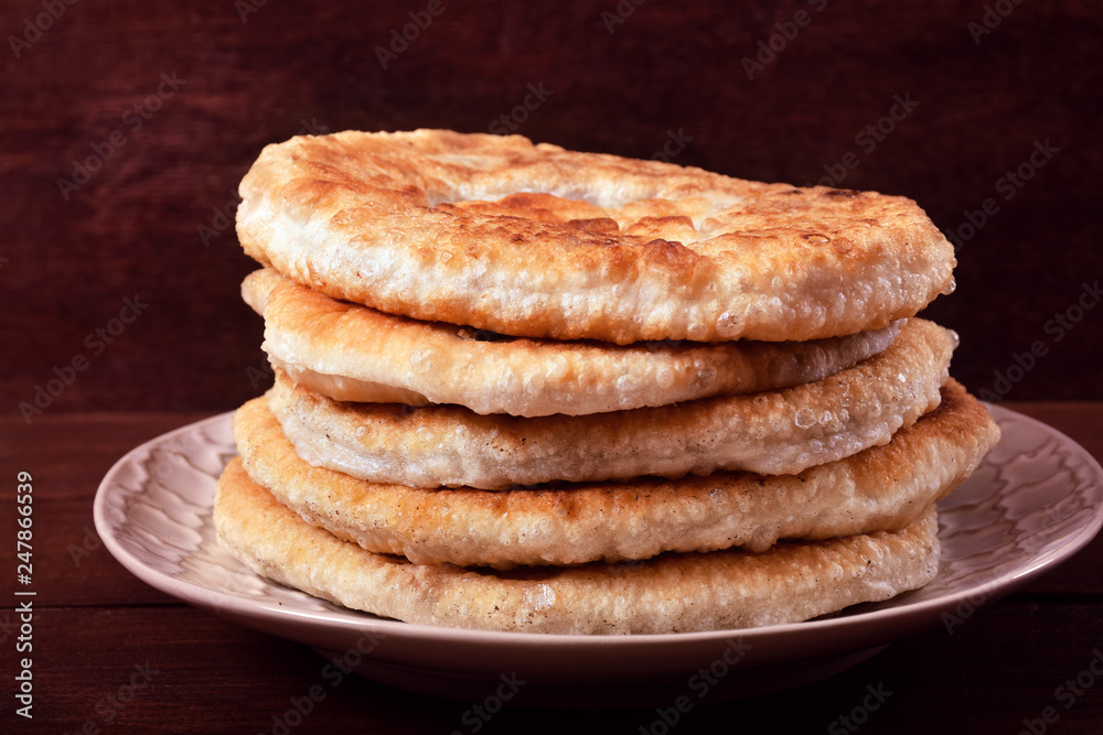Flapjacks with meat on a plate. Fried in a pan. Flapjacks with meat on a plate. Fried in a pan.