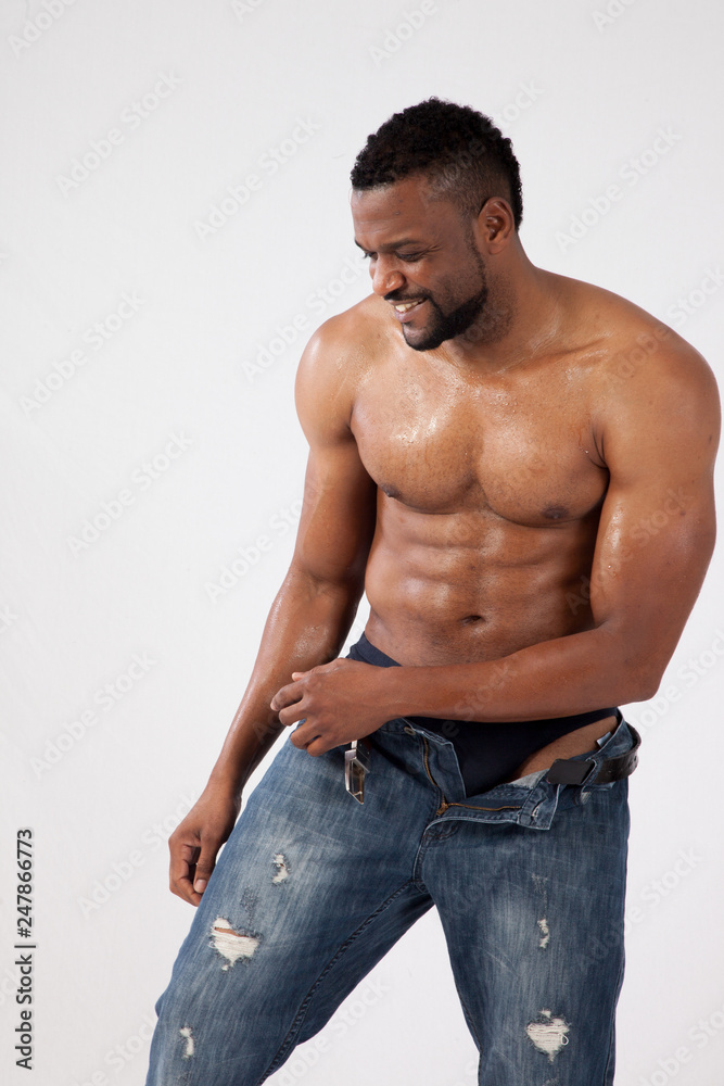 Happy Strong Black man with his shirt off Happy Strong Black man with his shirt off