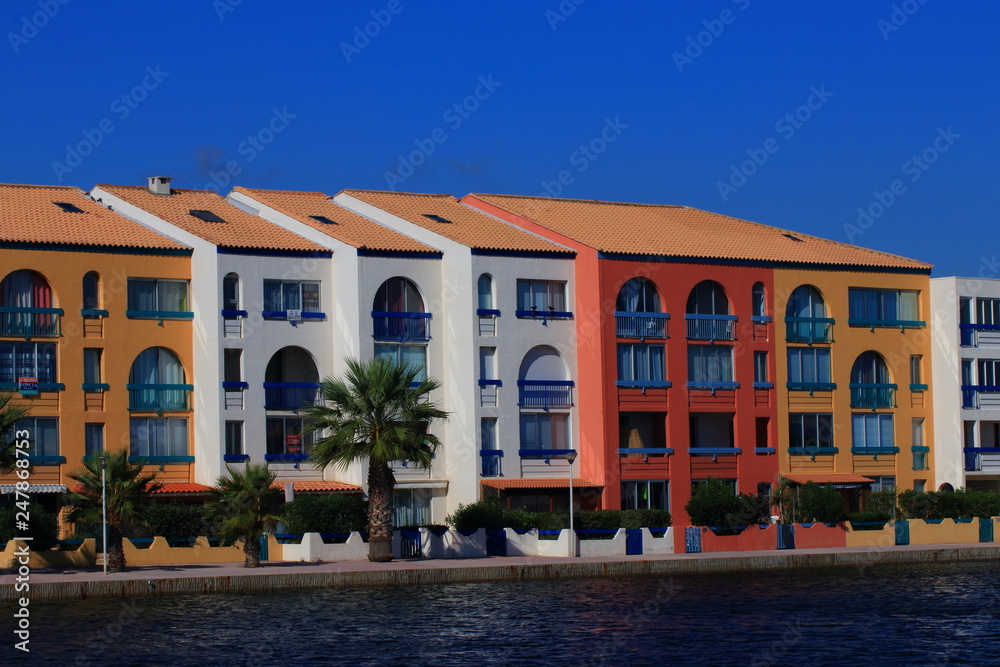 Modern and colorful apartment and palm in a mediterranean seaside town,Southern of  France