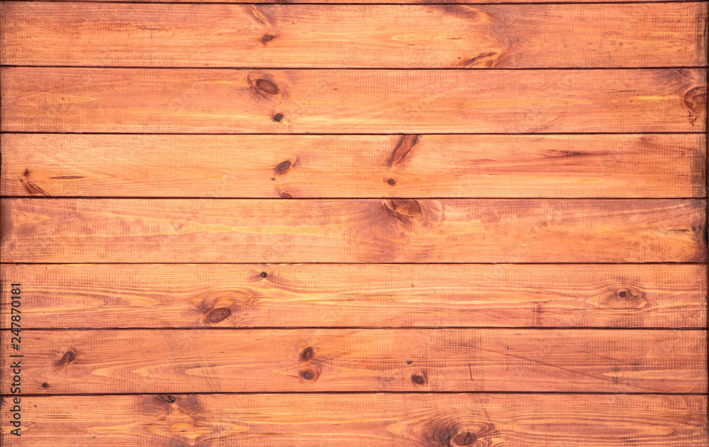 Naklejka premium closeup background of orange wood old texture
