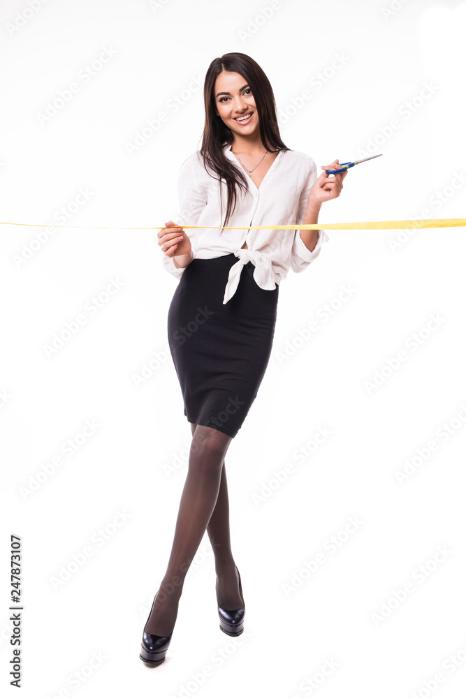Happy businesswoman ready to cut yellow ribbon opening ceremony, isolated on white background Happy businesswoman ready to cut yellow ribbon opening ceremony, isolated on white background