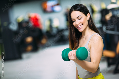 Beautiful fit woman at gym