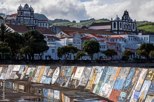 Harbour wall painted by sailors, harbor, marina, behind left Igreja de Nossa Senhora do Carmo, behind right Igreja Matriz, Horta, island Faial, Azores, Portugal, Europe