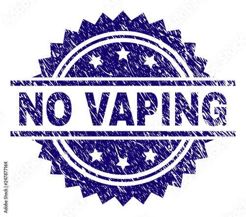 NO VAPING stamp seal watermark with distress style. Blue vector rubber print of NO VAPING text with scratched texture.