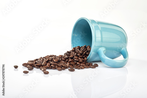 Coffee beans in coffee cup isolated on white background