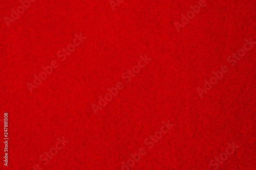 Soft bright red carpet as background, top view