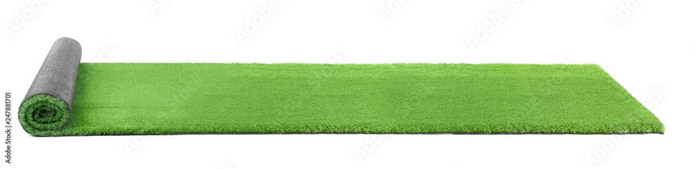 Naklejka Rolled artificial grass carpet on white background. Exterior element
