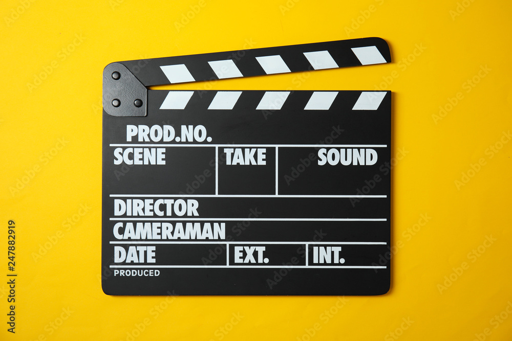 Clapperboard on color background, top view. Cinema production
