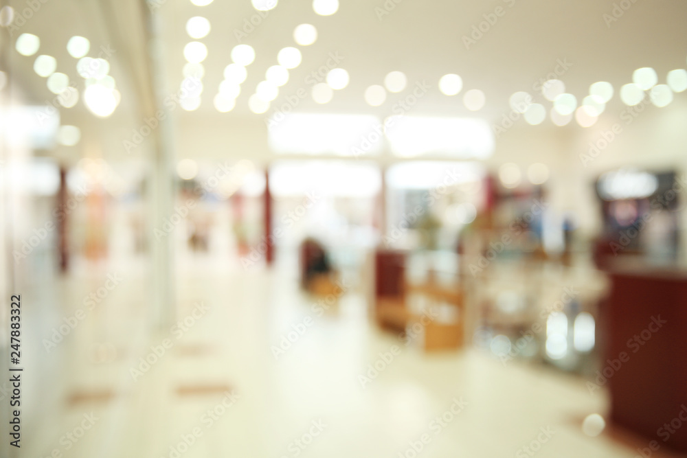 Blurred view of modern shopping mall interior Blurred view of modern shopping mall interior