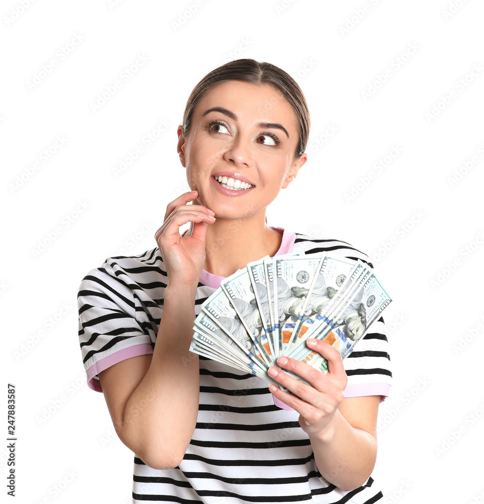 Portrait of young woman holding money banknotes on white background Portrait of young woman holding money banknotes on white background