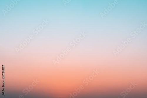 Billede på lærred Abstract gradient sunrise in the sky with blue and orange natural background