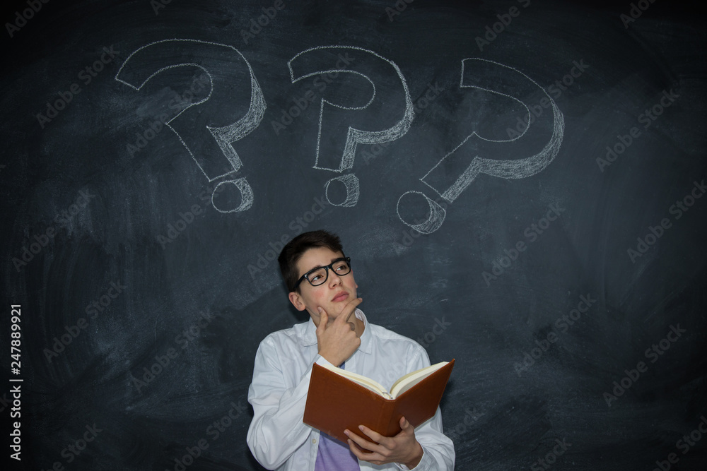 young man with book and question