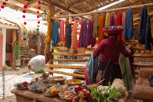 Chinchero, Cusco, Peru. December 2018, Process of natural dyeing of alpaca and llama wool, Quechua woman.