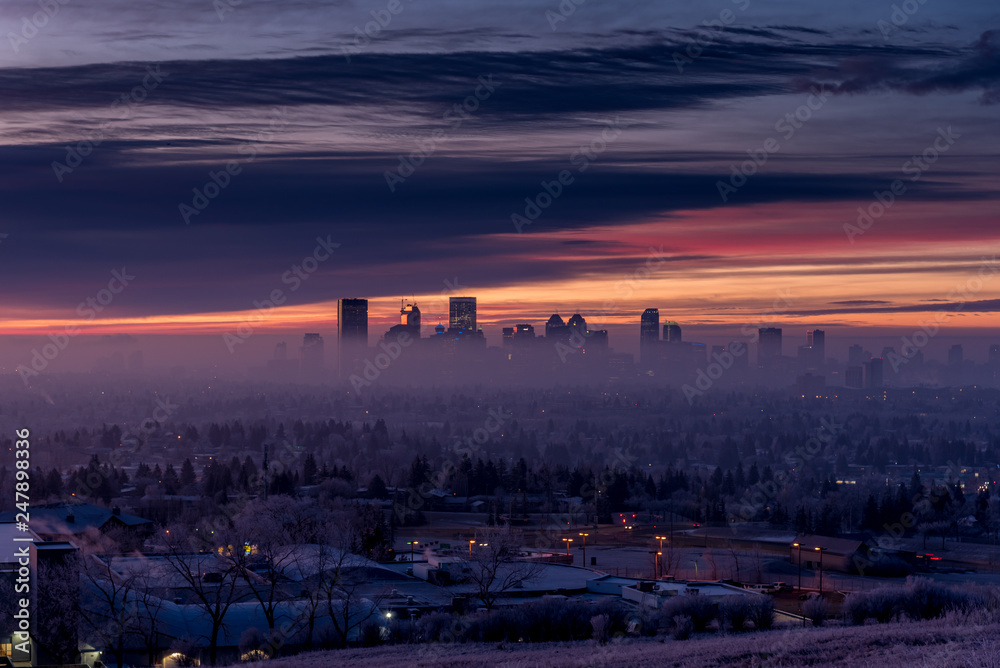 View of Calgary's skyline from Nose Hill Park on a winter morning. 