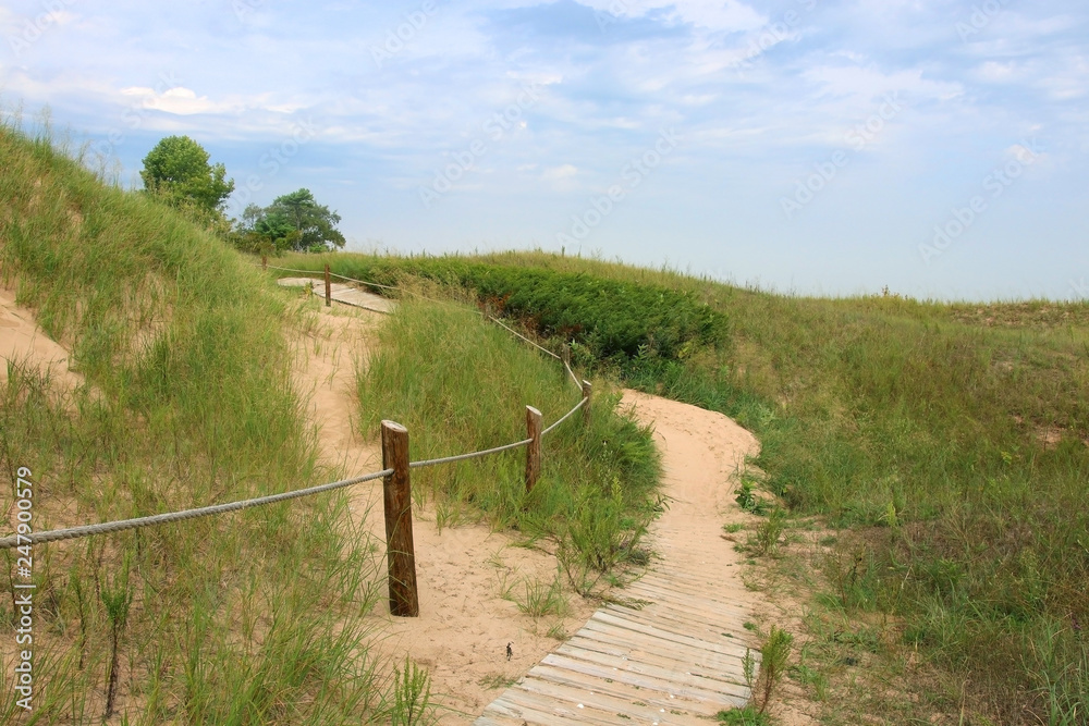 Kohler-Andrae State Park, Sheboygan area, Wisconsin, Midwest USA. Landscape with hiking trail through sand dunes. Wisconsin nature background.