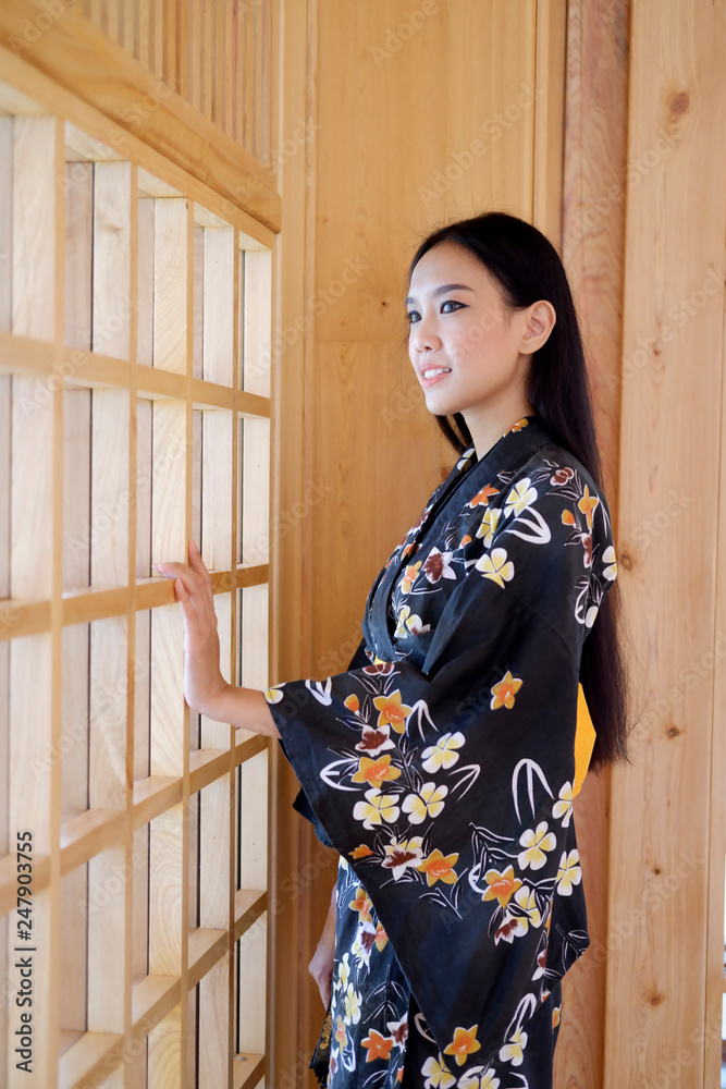 Young asian woman wearing traditional japanese kimono dress