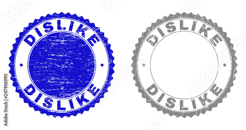 Grunge DISLIKE stamp seals isolated on a white background. Rosette seals with distress texture in blue and grey colors. Vector rubber stamp imprint of DISLIKE tag inside round rosette.