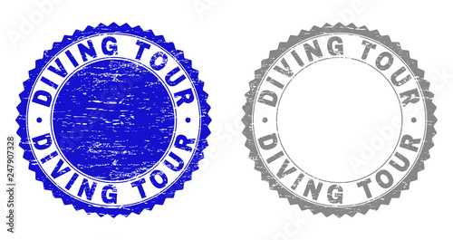 Grunge DIVING TOUR stamp seals isolated on a white background. Rosette seals with distress texture in blue and grey colors. Vector rubber stamp imitation of DIVING TOUR caption inside round rosette.