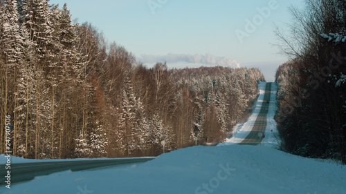 winter landscape with lake and forest