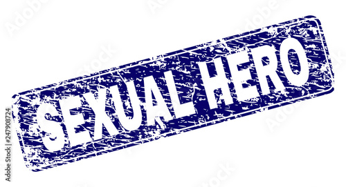 SEXUAL HERO stamp seal print with distress style. Seal shape is a rounded rectangle with frame. Blue vector rubber print of SEXUAL HERO label with scratched style.