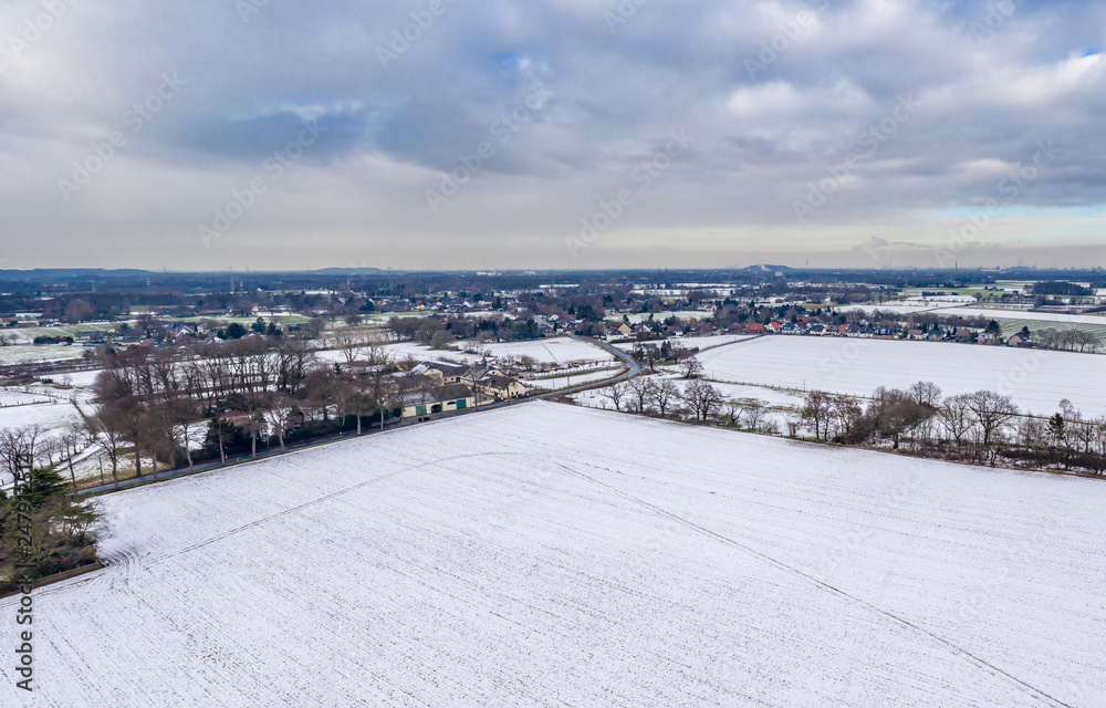 Aerial shot of Holderberg village in Moers during winter, Germany