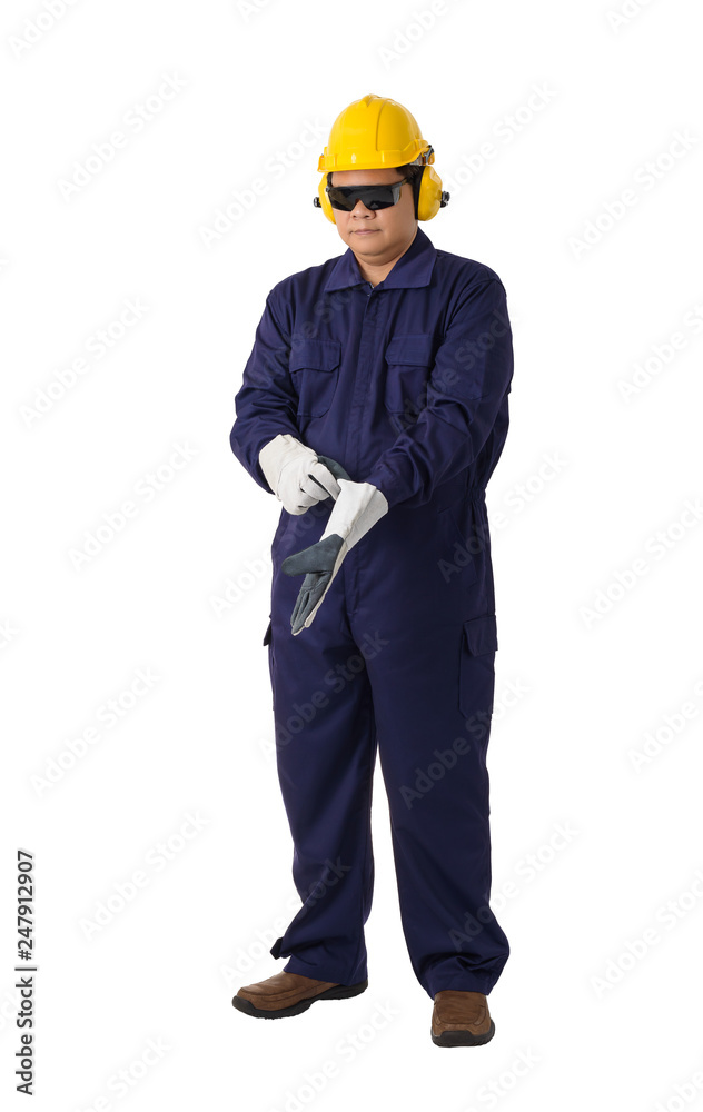 portrait of a worker in Mechanic Jumpsuit is Removing gloves isolated on white background portrait of a worker in Mechanic Jumpsuit is Removing gloves isolated on white background