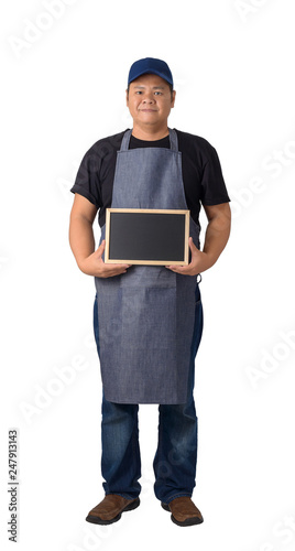worker man or Serviceman in Black shirt and apron is holding chalkboard isolated