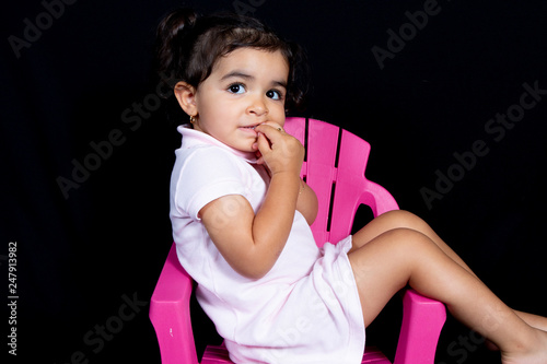 cute child girl portrait childhood on black background