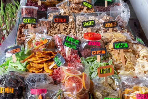 Tableau sur toile CUZCO, PERU - December 15, 2018: A dried fruit stall in Mercado San Pedro market
