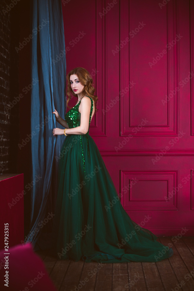Woman in gorgeous green long evening chiffon dress, fashionable trend for ladies Woman in gorgeous green long evening chiffon dress, fashionable trend for ladies