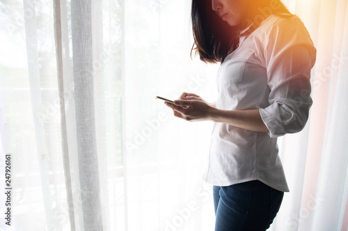 young asian woman using smartphone, mobile.