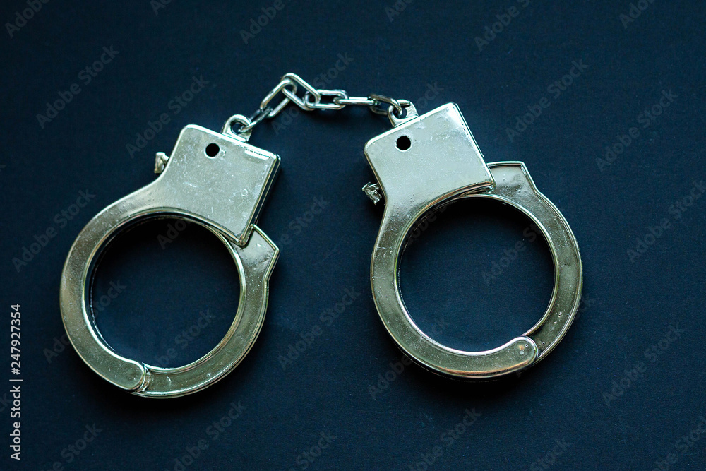 Handcuffs on black Handcuffs on black