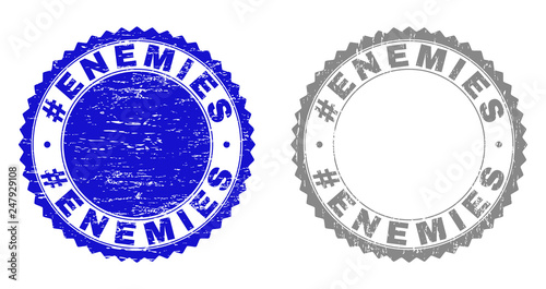 Grunge #ENEMIES stamp seals isolated on a white background. Rosette seals with grunge texture in blue and grey colors. Vector rubber overlay of #ENEMIES caption inside round rosette.