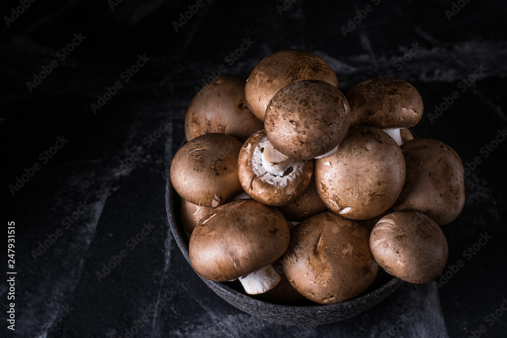 Harvest of mushrooms in plate. Selective focus. Royal champignon. Vegan. Vegetarian food, Vitamin. Healthy food. Process of cooking. Harvest of mushrooms in plate. Selective focus. Royal champignon. Vegan. Vegetarian food, Vitamin. Healthy food. Process of cooking.