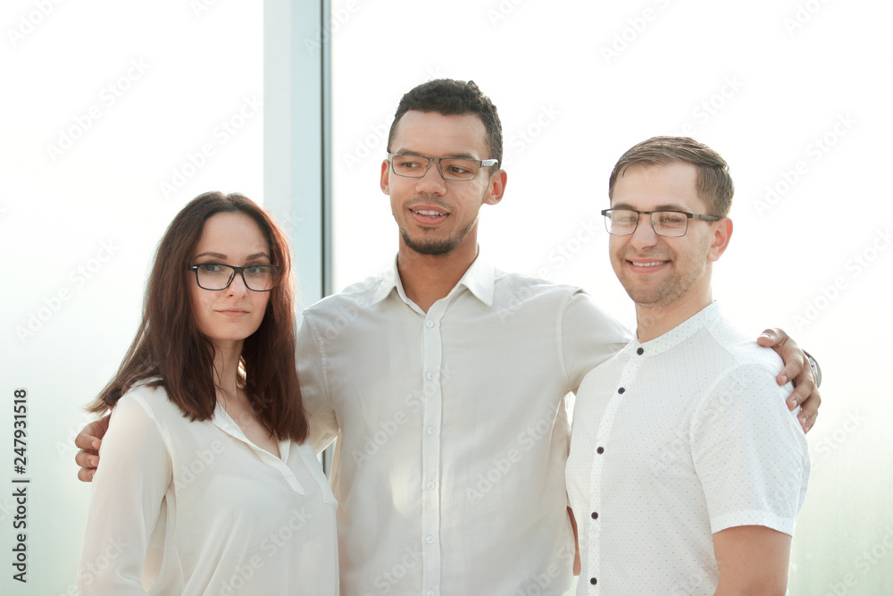 close up.professional business team standing in a bright office close up.professional business team standing in a bright office