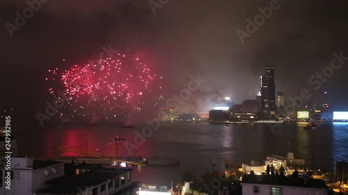 Fireworks over Victoria Harbor in Hong Kong photo