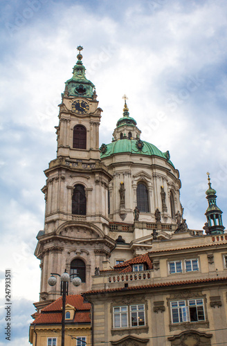 St. Nicholas Cathedral in Prague. Mala Strana. Architecture of Prague old town © ppvector