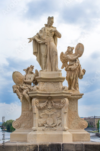 Statues on the Charles Bridge in Prague. Architecture of Prague old town © ppvector