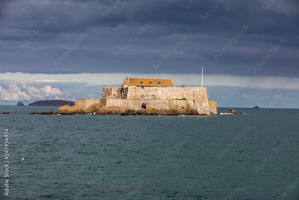  View of the Fort National in Saint Malo a tidal island in the English Channel at high tide. Brittany, France